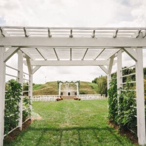 White wedding pergola, ceremony view.